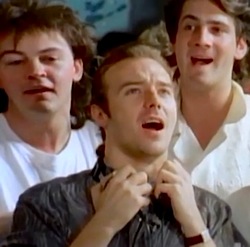 Midge Ure: recording the Band Aid single, here with Paul Young and Tony Hadley © 1984 Mercury Records 