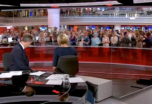 2 – Live on air: co-anchor Julian Worricker turns his back on the viewers to loyally give HMQ a bow from the neck. This instantly raises a huge burst of cheers and waves from the 300 hundred journalists throughout the BBC newsroom 